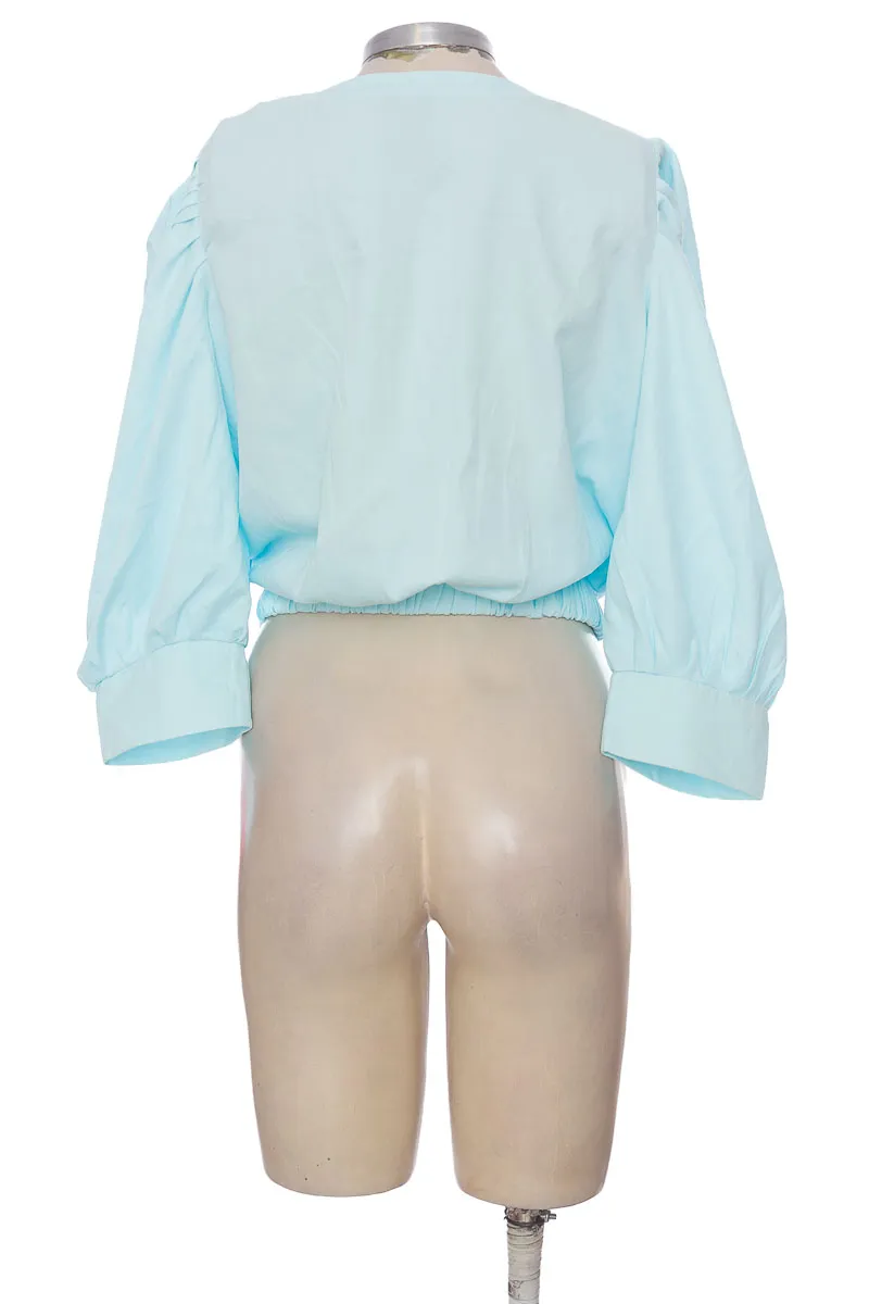 BLUSA COLOR AGUAMARINA  CLOSEANDO