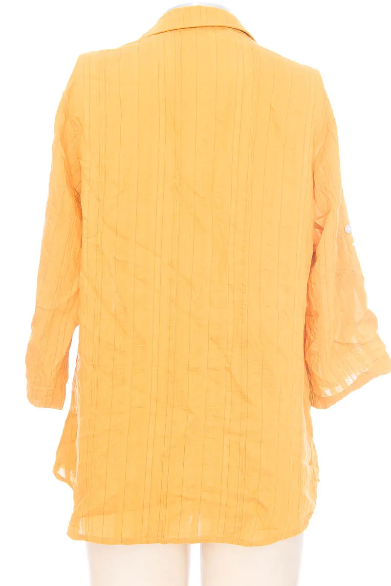 BLUSA COLOR AMARILLO  CLOSEANDO