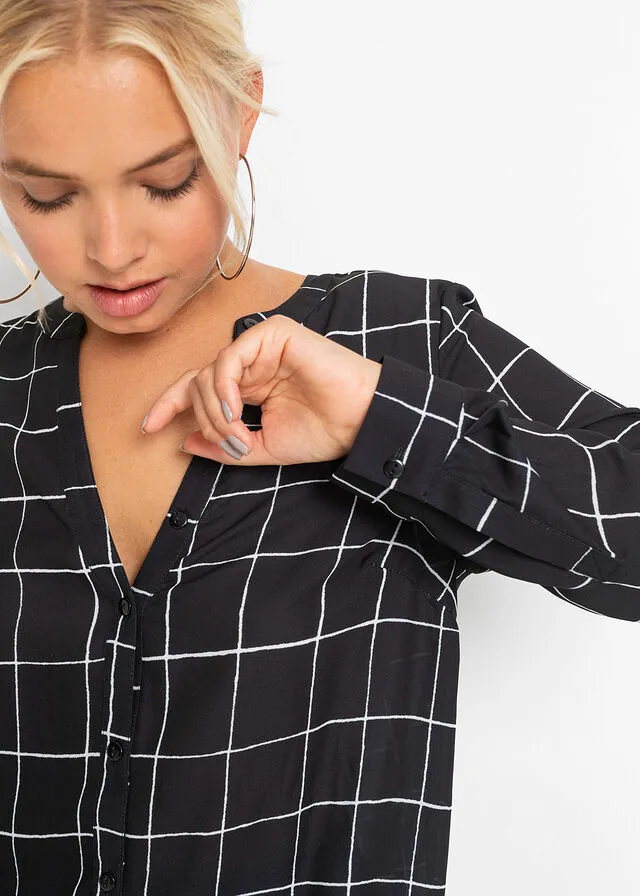 BLUSA LARGA NEGROBLANCO DE CUADROS