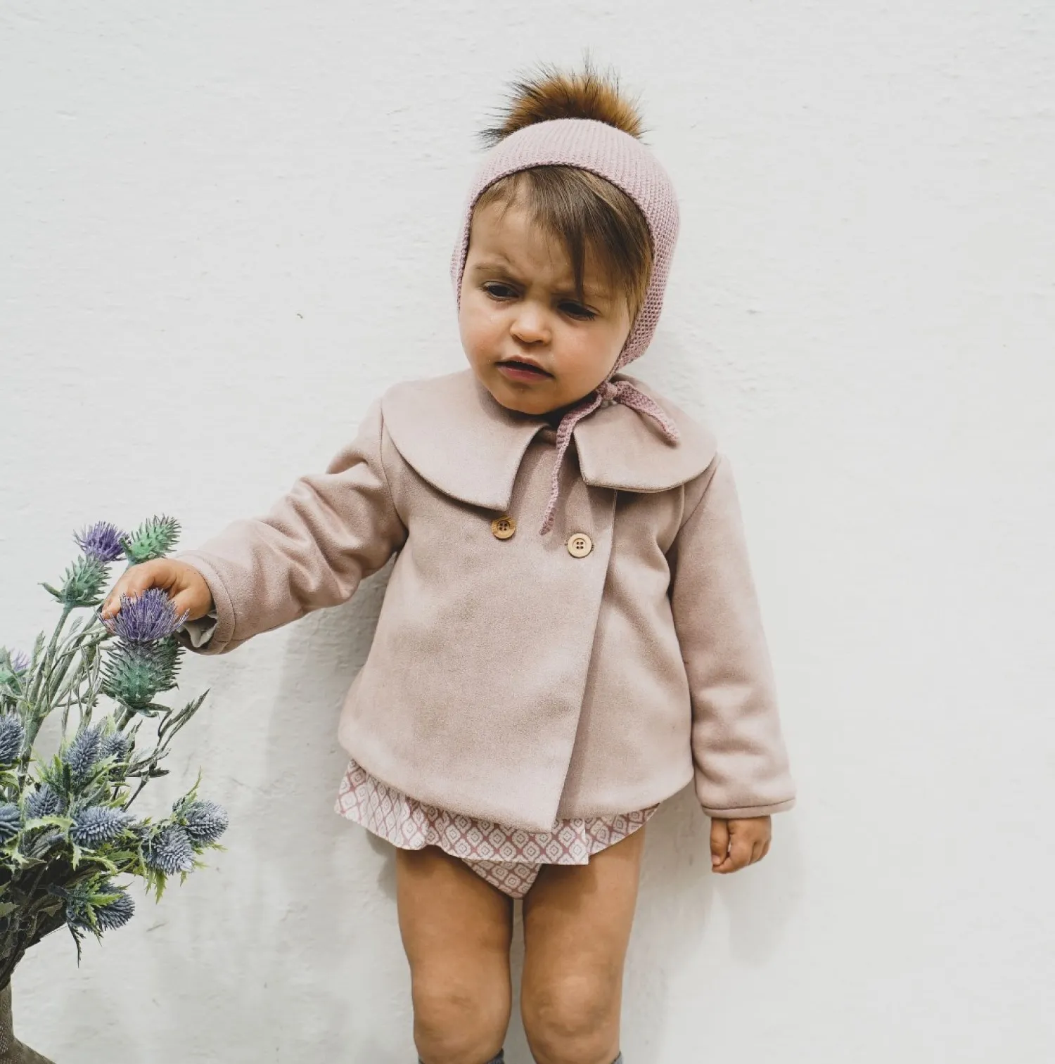 Conjunto bebé niña. Chaqueta y braguita
