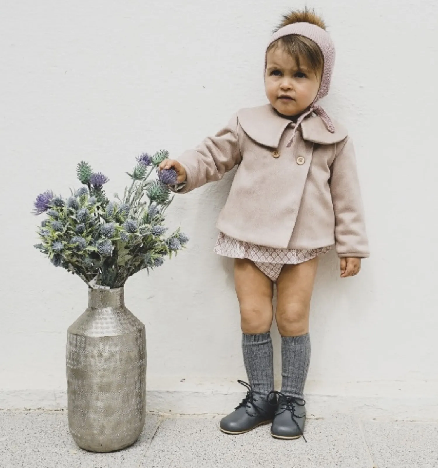 Conjunto bebé niña. Chaqueta y braguita