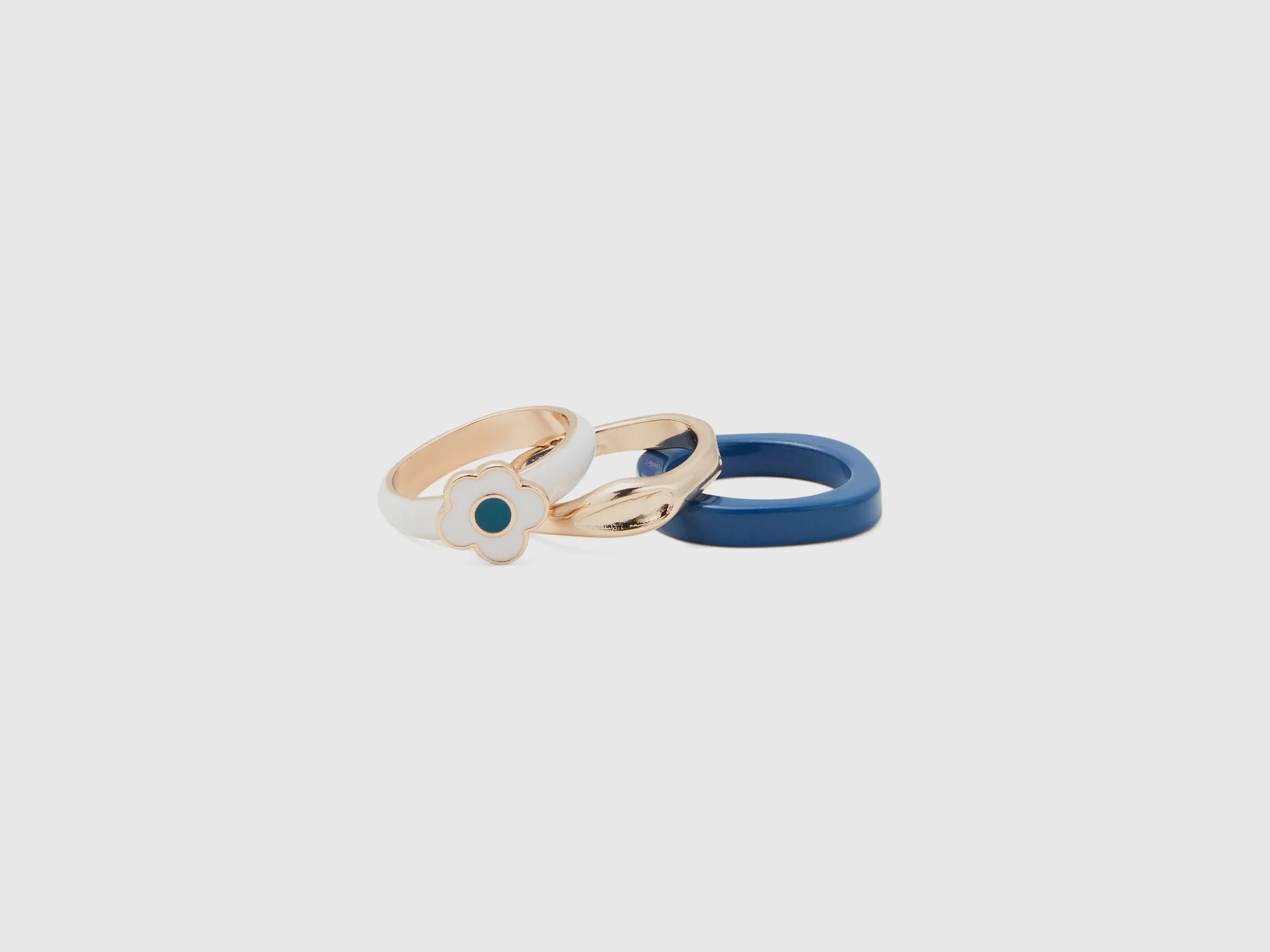 Tres anillo azul, dorado y blanco
