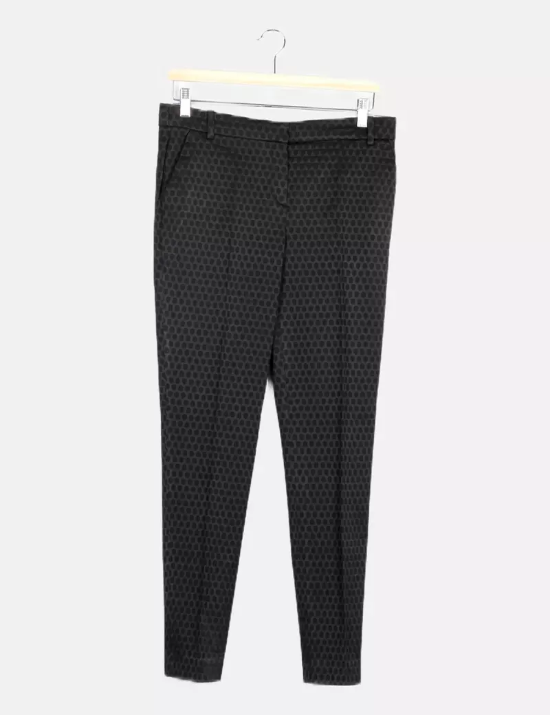 Uterqüe Pantalón negro estampado